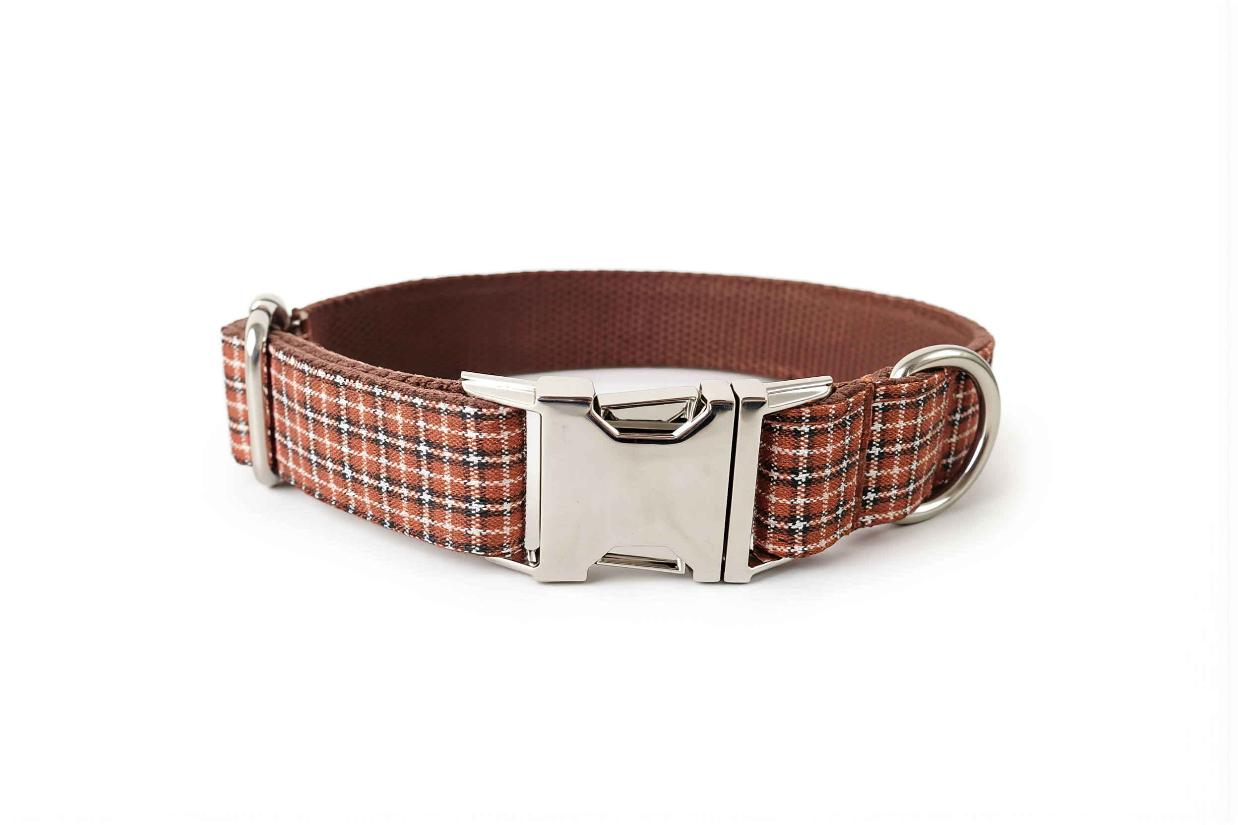 Plaid dog collar with a metal buckle on a white background