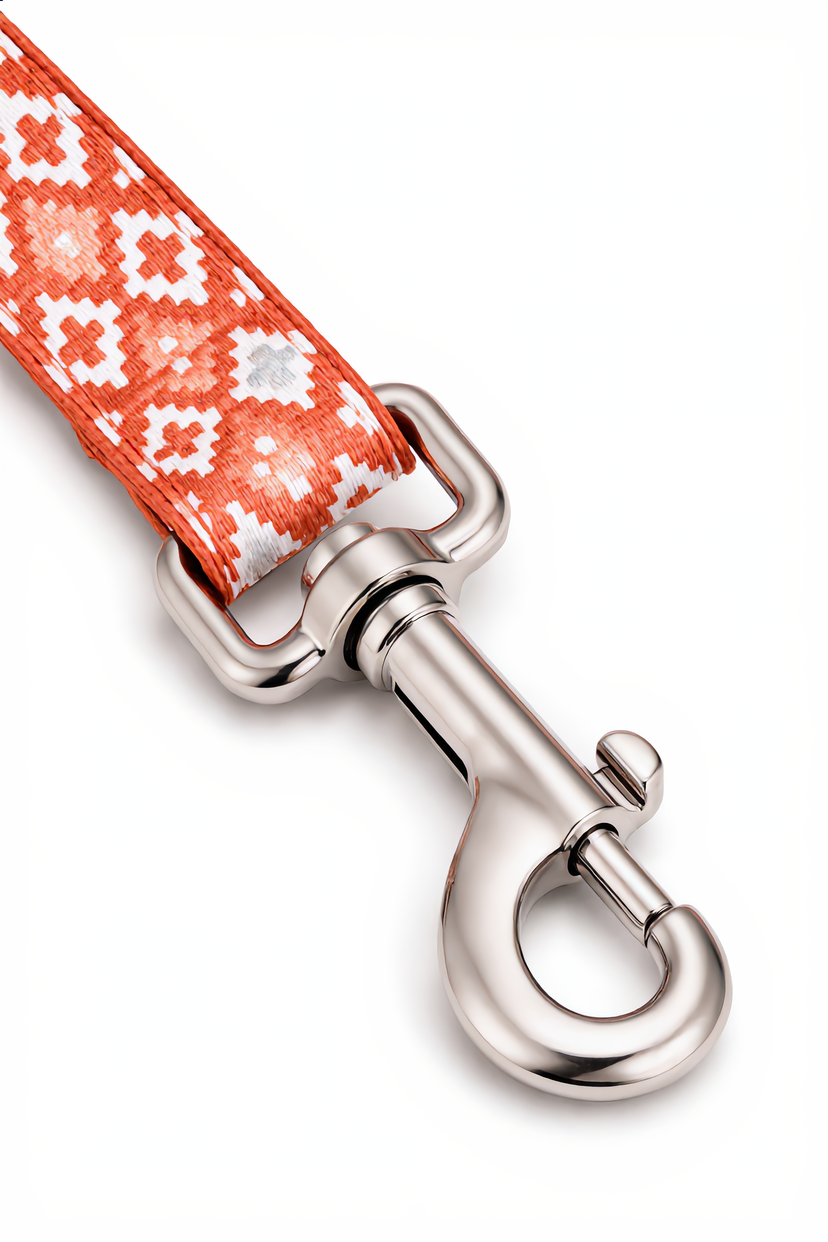 Dog leash with floral pattern and metal clip on a white background