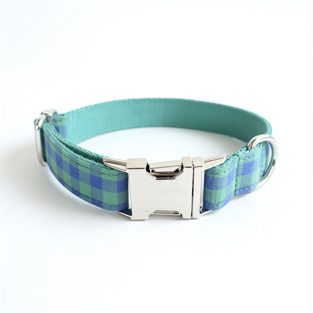 Plaid dog collar with a metal buckle on a white background